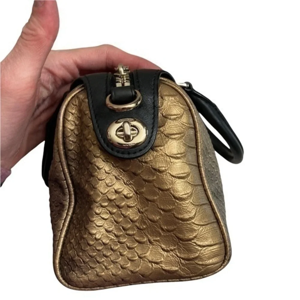 Coach gold embossed leather mini barrel bag
